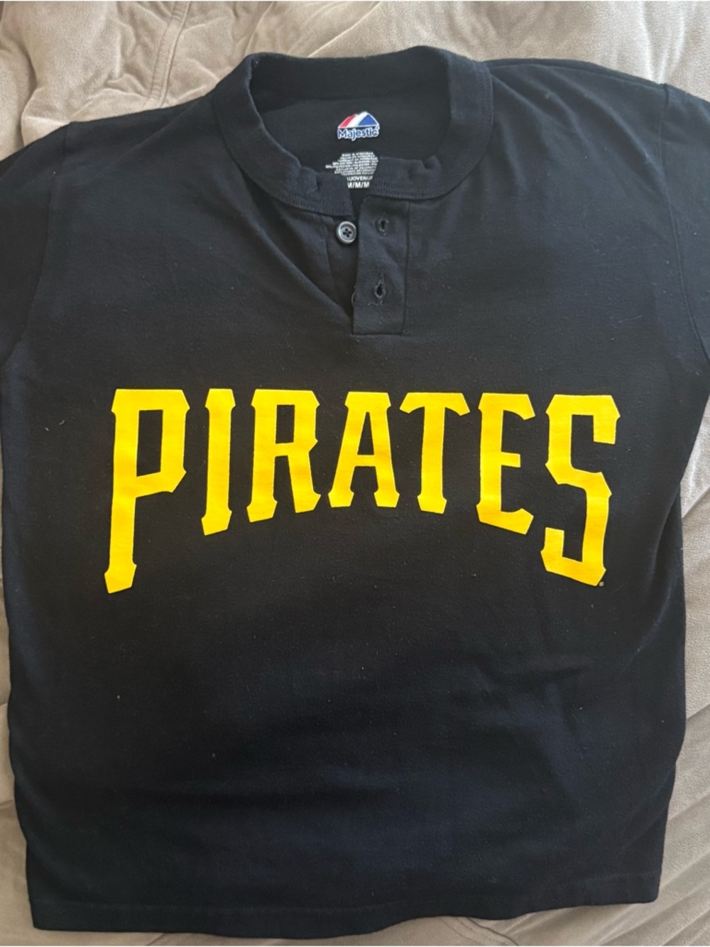 Majestic Black Tee with Yellow PIRATES Chest Logo